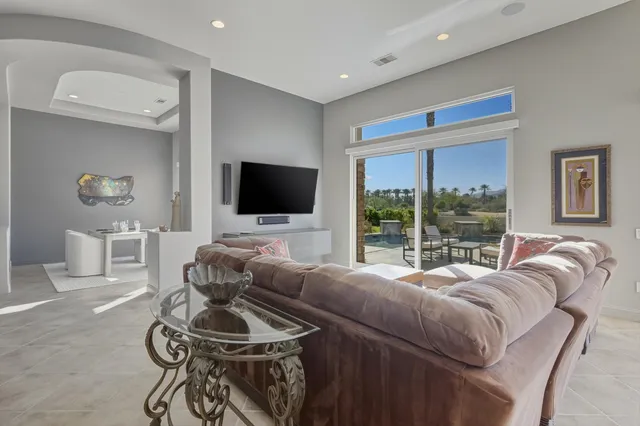 a kitchen with refrigerator cabinets and outdoor seating