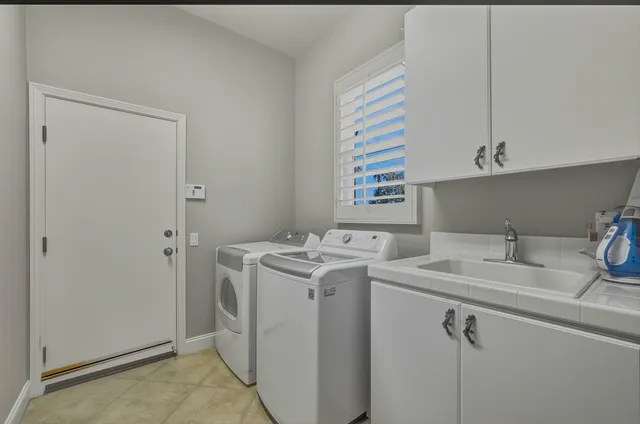 a view of a patio with a table chairs and a patio