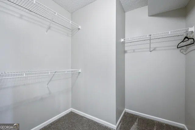 a view of a room with racks on the wall