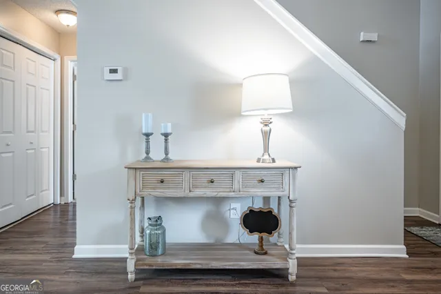 a view of entryway with wooden floor