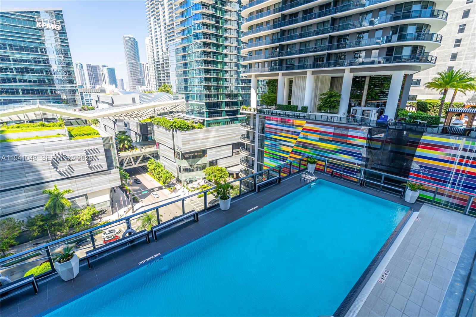 45 Southwest 9th Street, Unit 1001 Miami, FL 33130 - Photo 25 of 40 a view of swimming pool with outdoor seating