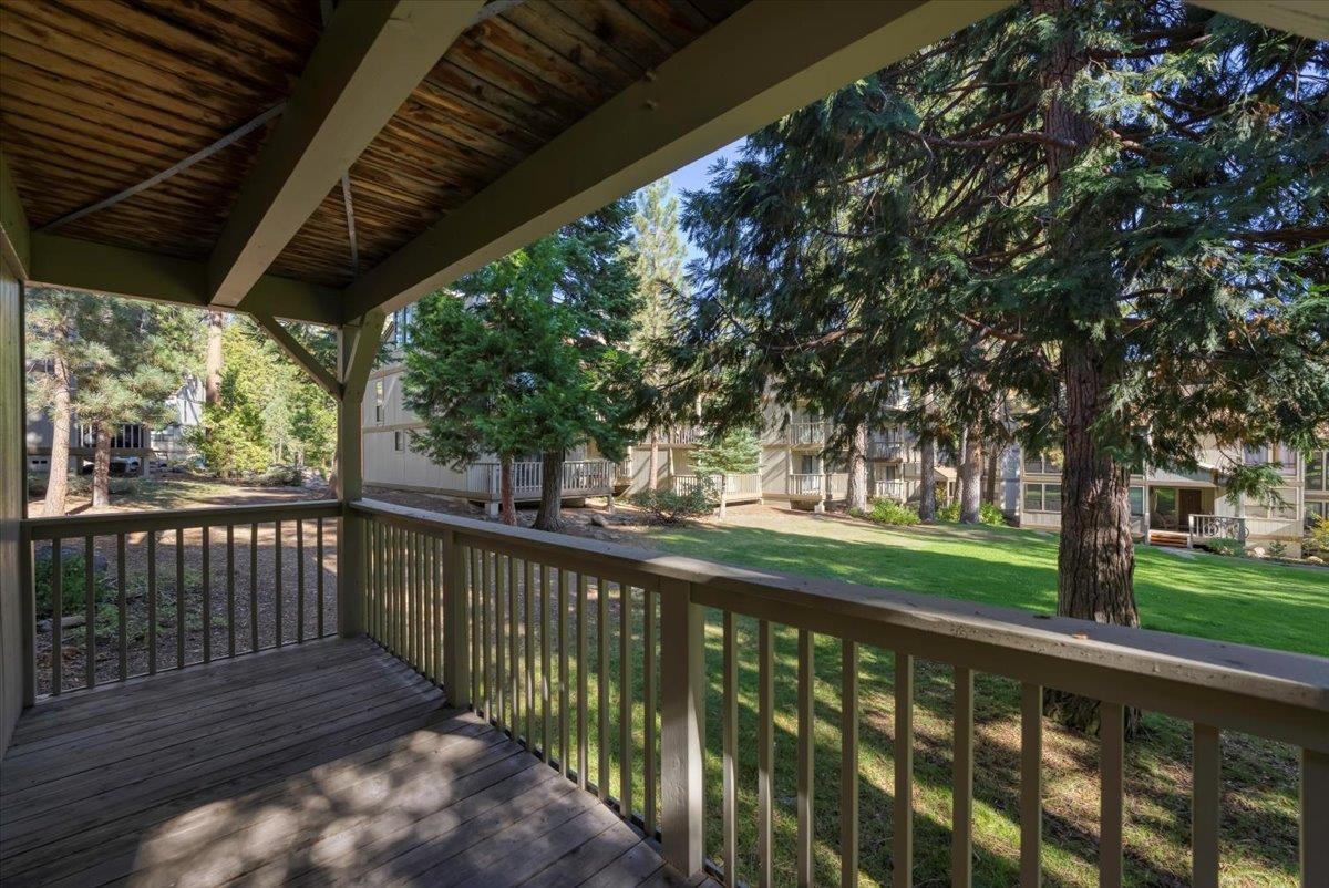 1001 Commonwealth Drive, Unit 49 Kings Beach, CA 96143 - Photo 25 of 25 a view of a wooden deck next to a yard