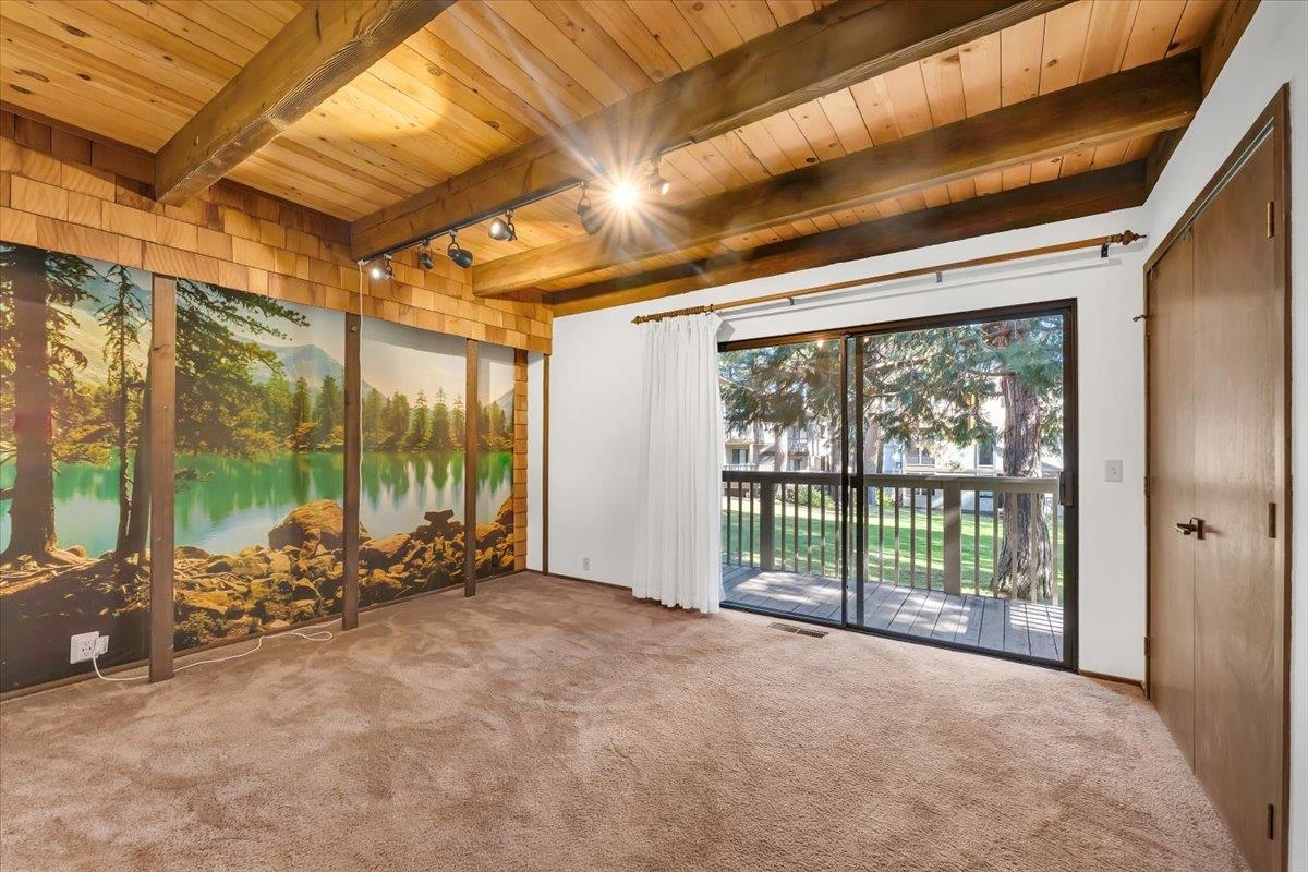 1001 Commonwealth Drive, Unit 49 Kings Beach, CA 96143 - Photo 6 of 25 a view of an empty room with windows and mountain view