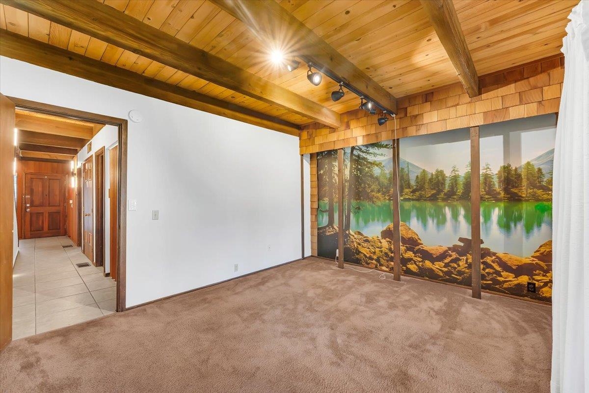 1001 Commonwealth Drive, Unit 49 Kings Beach, CA 96143 - Photo 7 of 25 a view of a room with wooden floor and windows