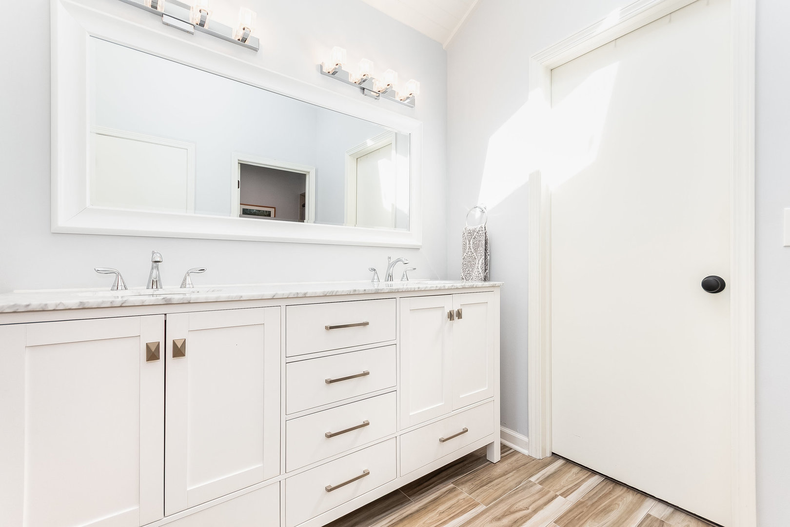 2245 Lakeside Drive Aurora, IL 60504 - Photo 11 of 32 a bathroom with a sink and a mirror