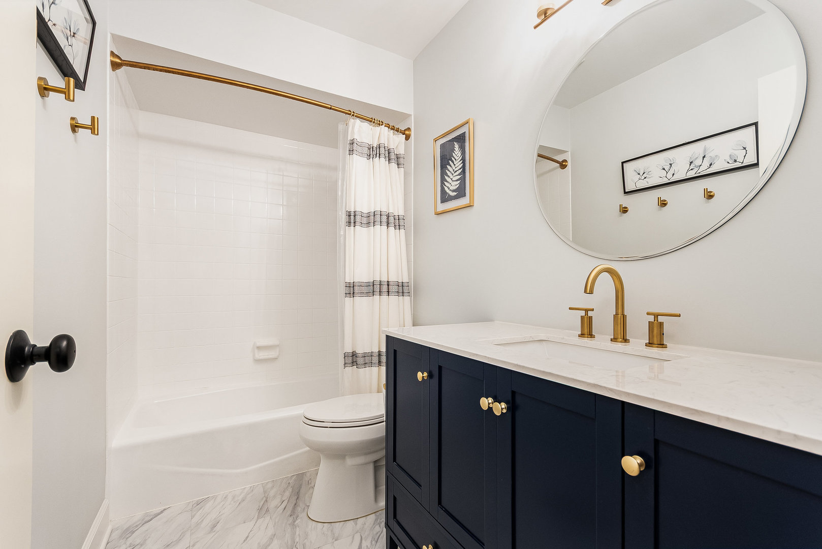 2245 Lakeside Drive Aurora, IL 60504 - Photo 14 of 32 a bathroom with a sink a toilet and shower