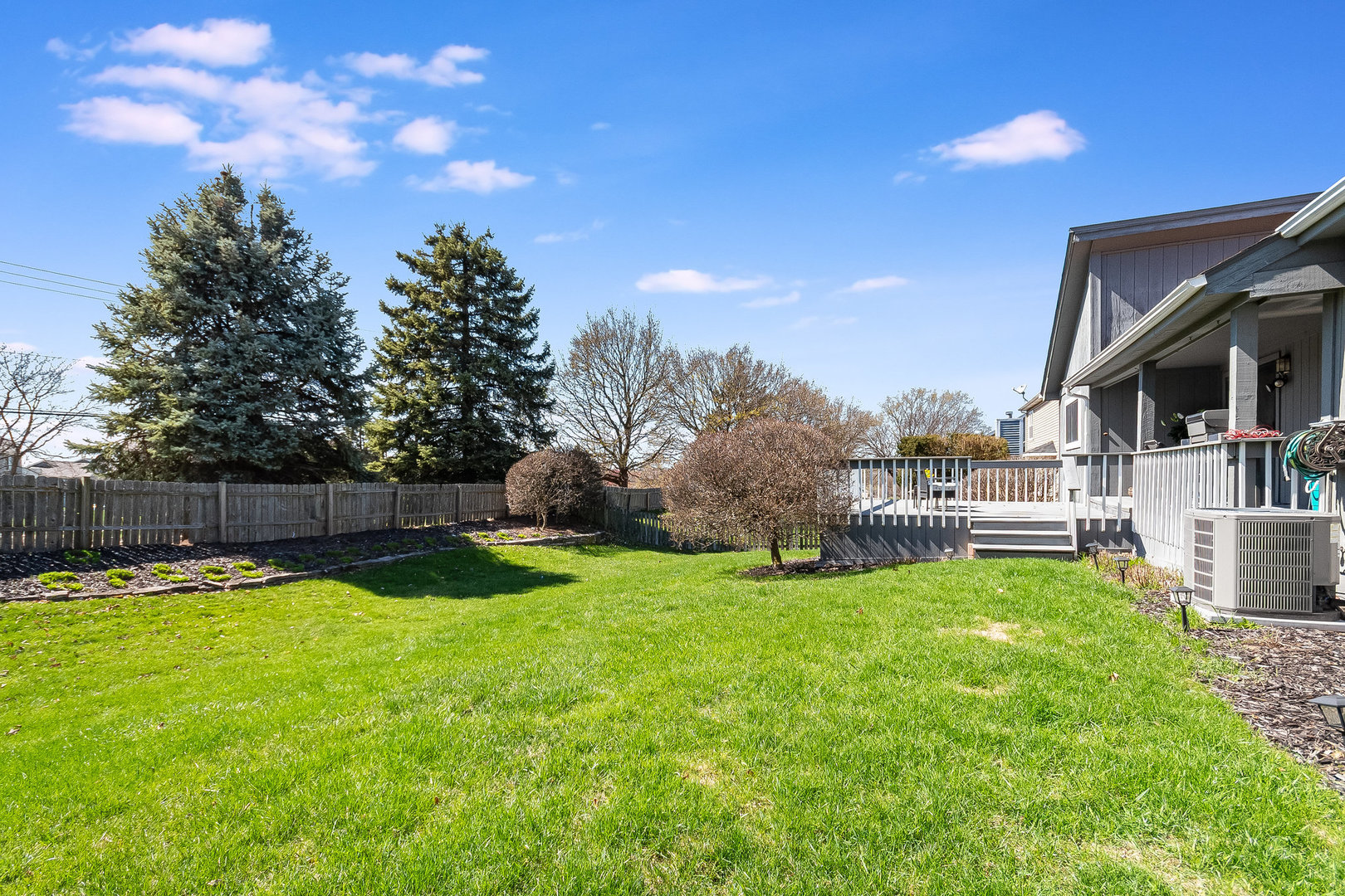 2245 Lakeside Drive Aurora, IL 60504 - Photo 21 of 32 a view of a backyard with swimming pool