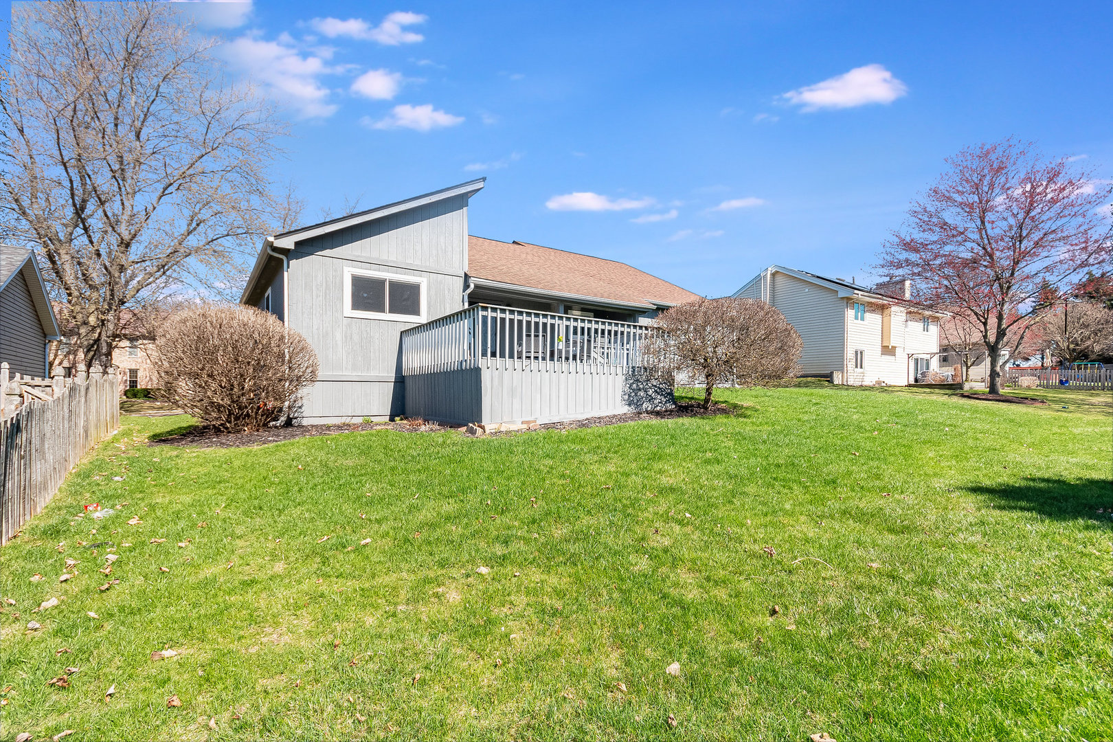 2245 Lakeside Drive Aurora, IL 60504 - Photo 22 of 32 a front view of house with yard and green space