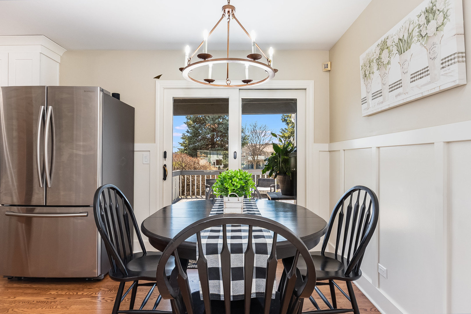 2245 Lakeside Drive Aurora, IL 60504 - Photo 9 of 32 a view of a dining room with furniture window and wooden floor
