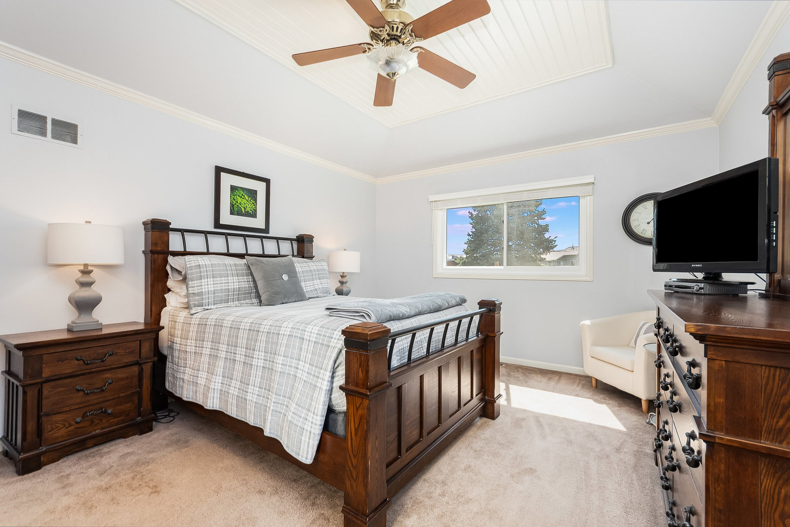 2245 Lakeside Drive Aurora, IL 60504 - Photo 10 of 32 a bedroom with a bed and a flat tv screen on dresser