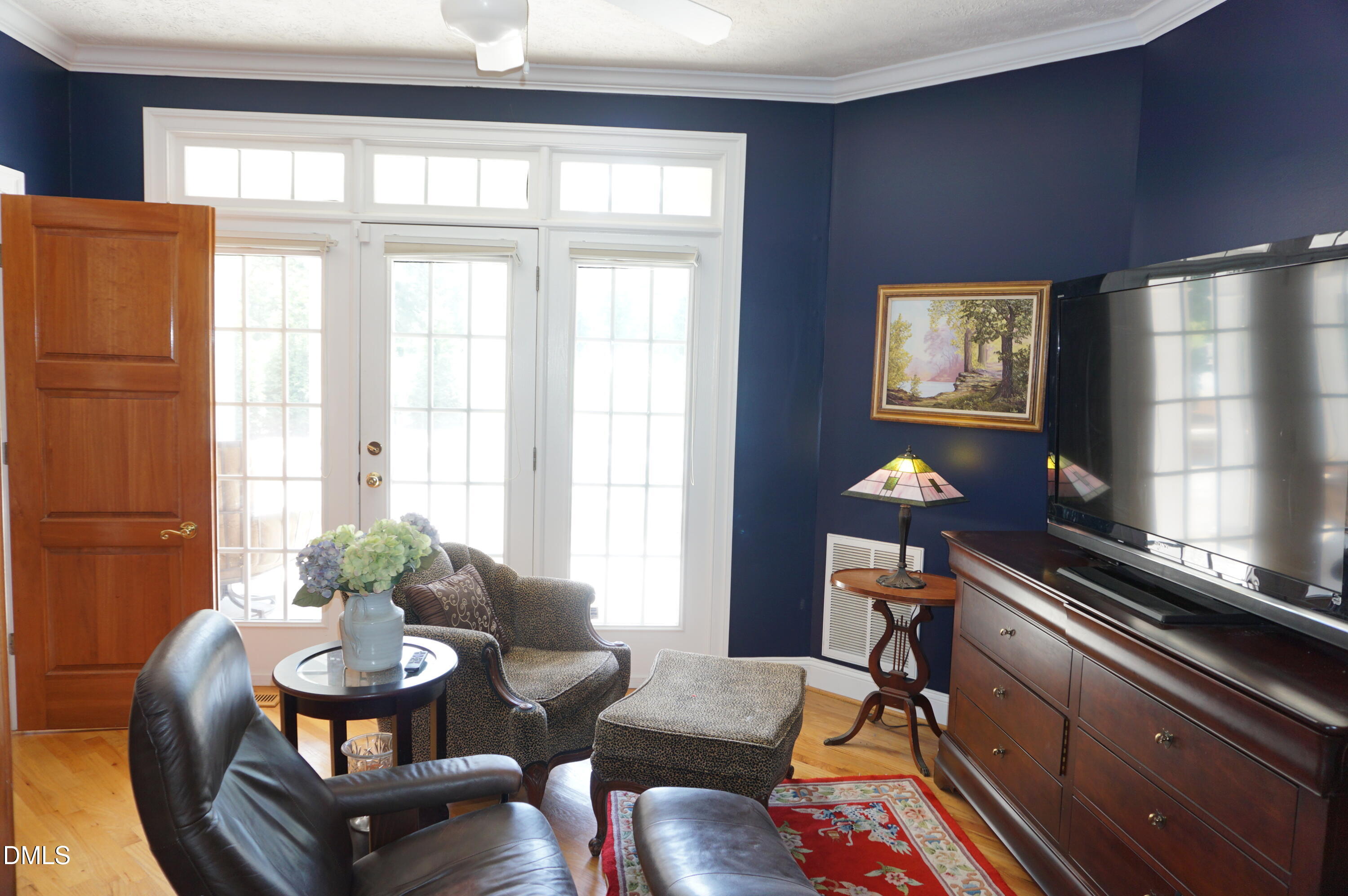 2125 Keith Hills Road Lillington, NC 27546 - Photo 33 of 66 a living room with furniture and wooden floor