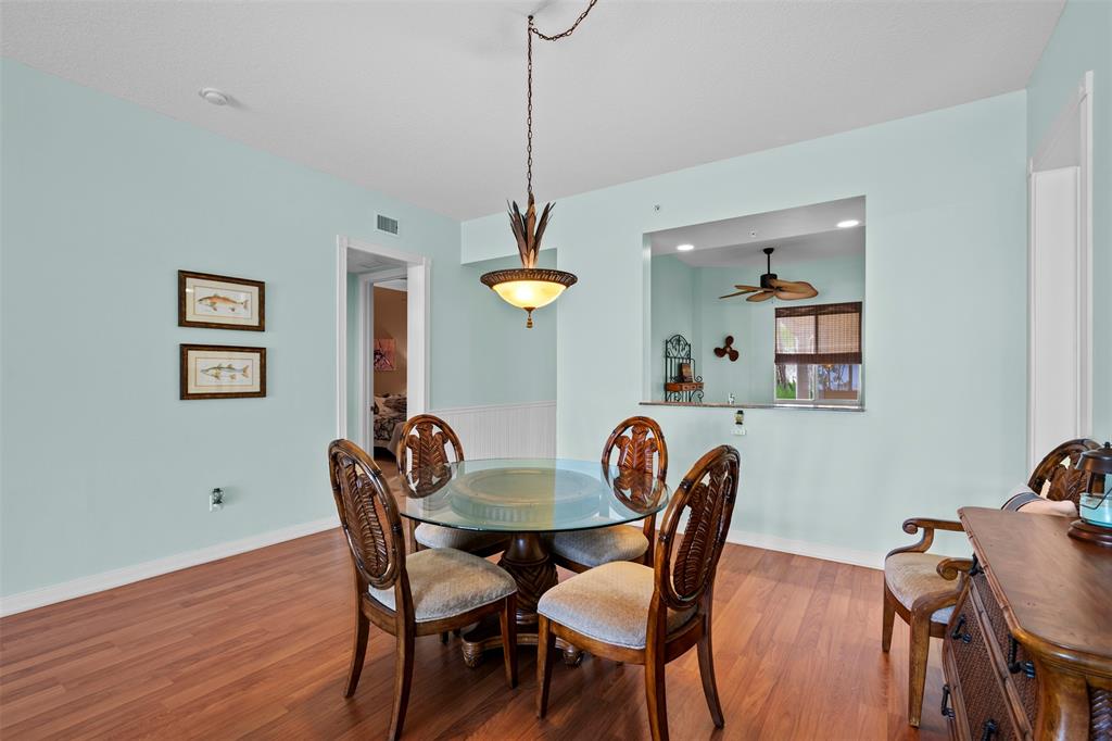 23 Harbour Isle Drive West, Unit 102 Fort Pierce, FL 34949 - Photo 11 of 40 a dining room with furniture and window