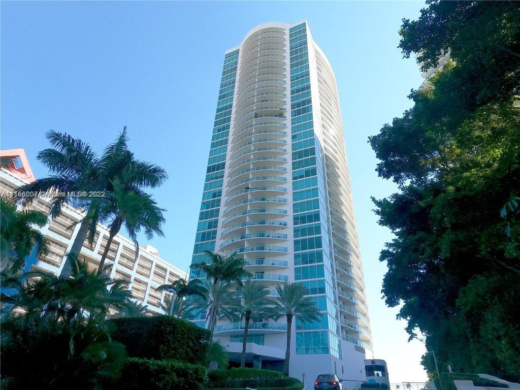2101 Brickell Avenue, Unit 1709 Miami, FL 33129 - Photo 1 of 14 a view of a tall building