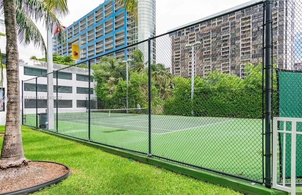 2101 Brickell Avenue, Unit 1709 Miami, FL 33129 - Photo 7 of 14 a view of a backyard and plants