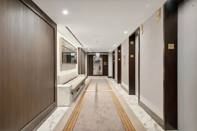 a view of dining room with furniture and wooden floor