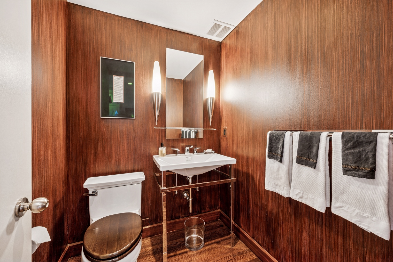 180 East Pearson Street, Unit 3701 Chicago, IL 60611 - Photo 26 of 36 a bathroom with a sink a toilet and mirror