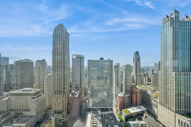 a view of a city with tall buildings