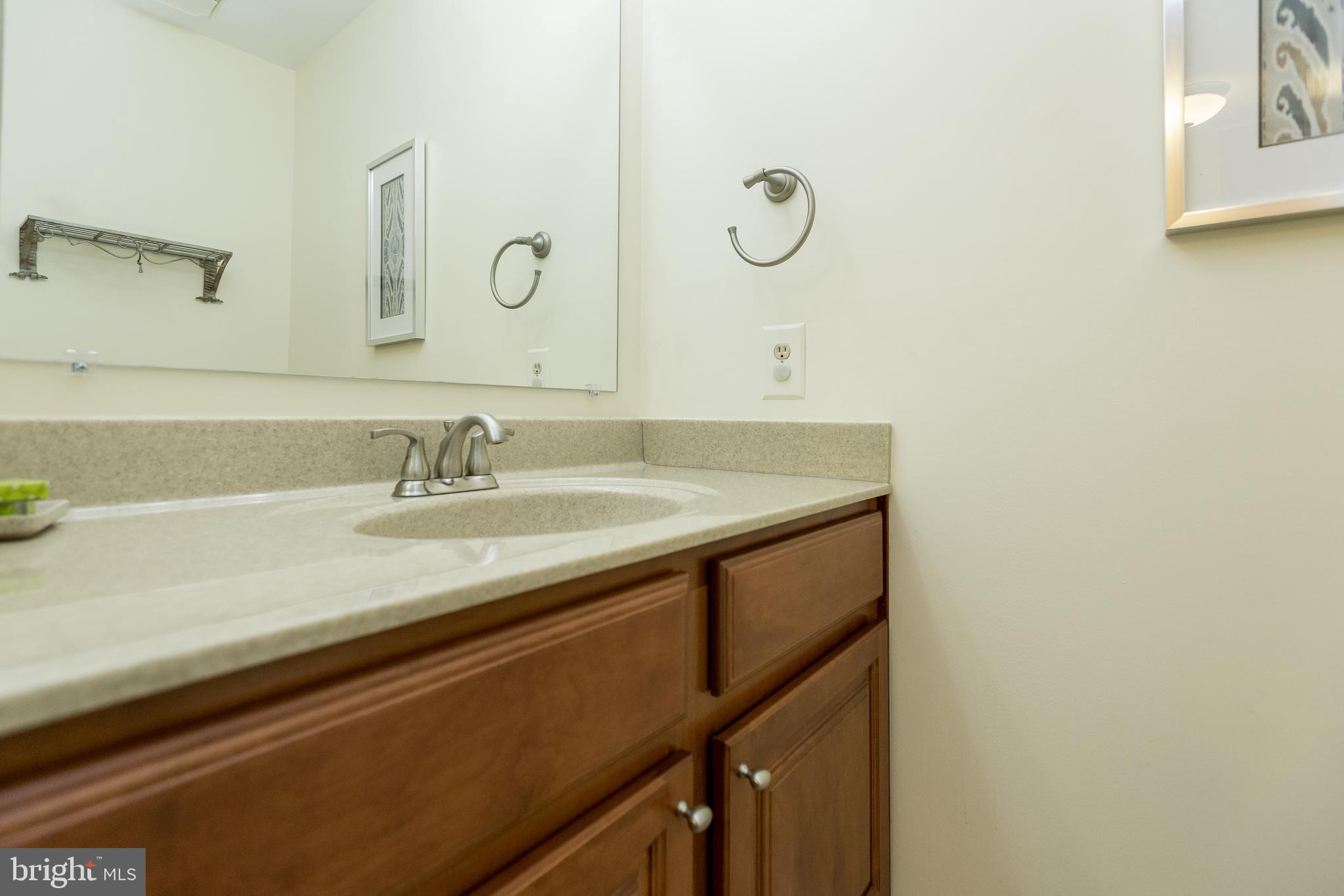 5806 Canvasback Road Burke, VA 22015 - Photo 24 of 43 Half bath at main level by the front door