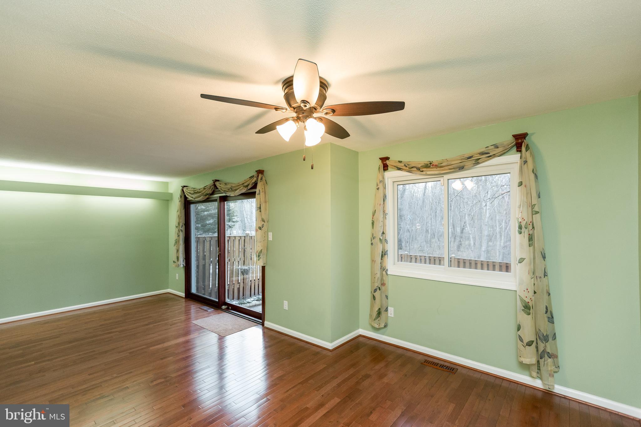5806 Canvasback Road Burke, VA 22015 - Photo 26 of 43 Living room onto patio