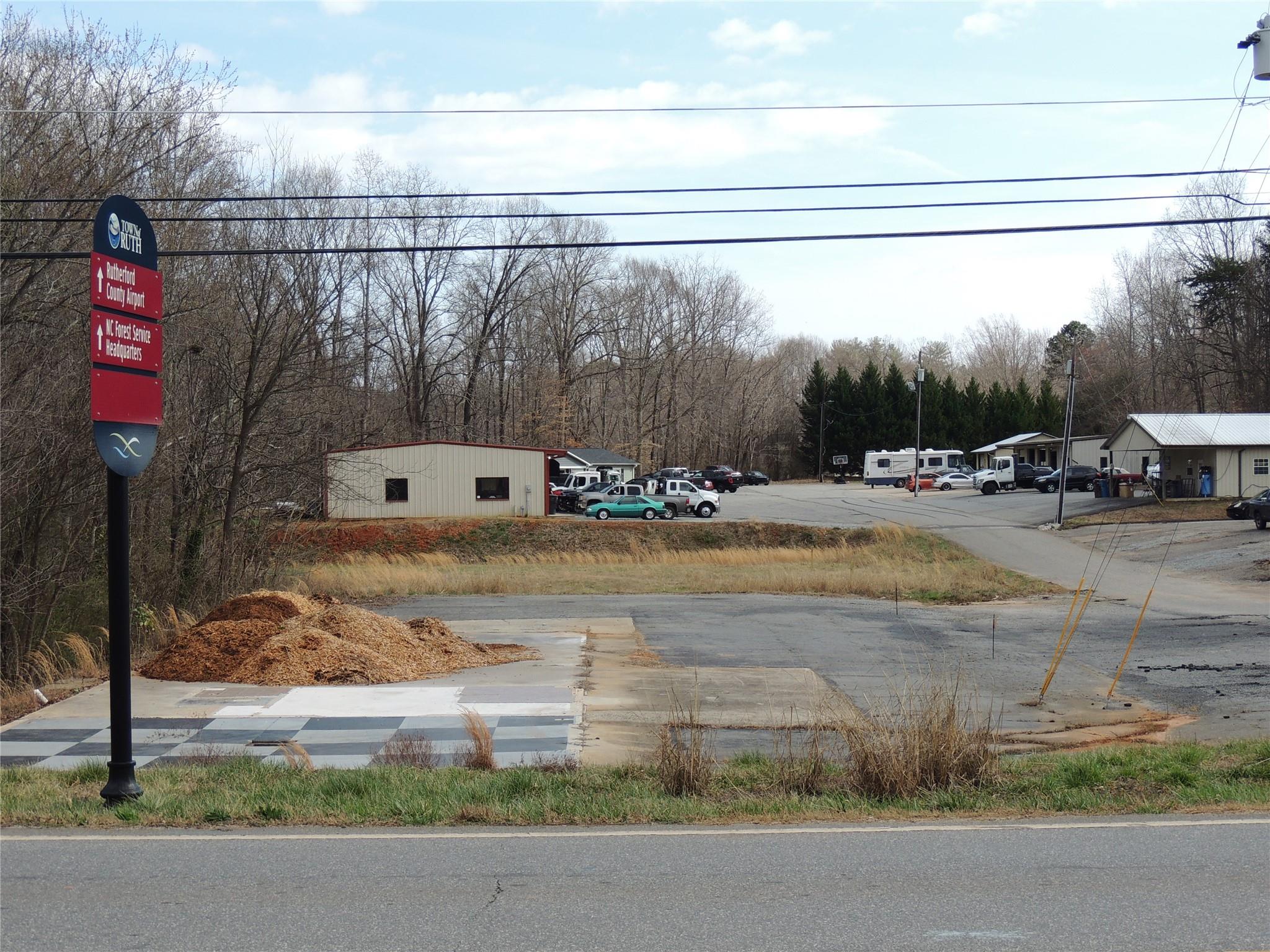 196 Highway 64 Rutherfordton, NC 28139 - Photo 1 of 10 a view of swimming pool with a yard and sitting area