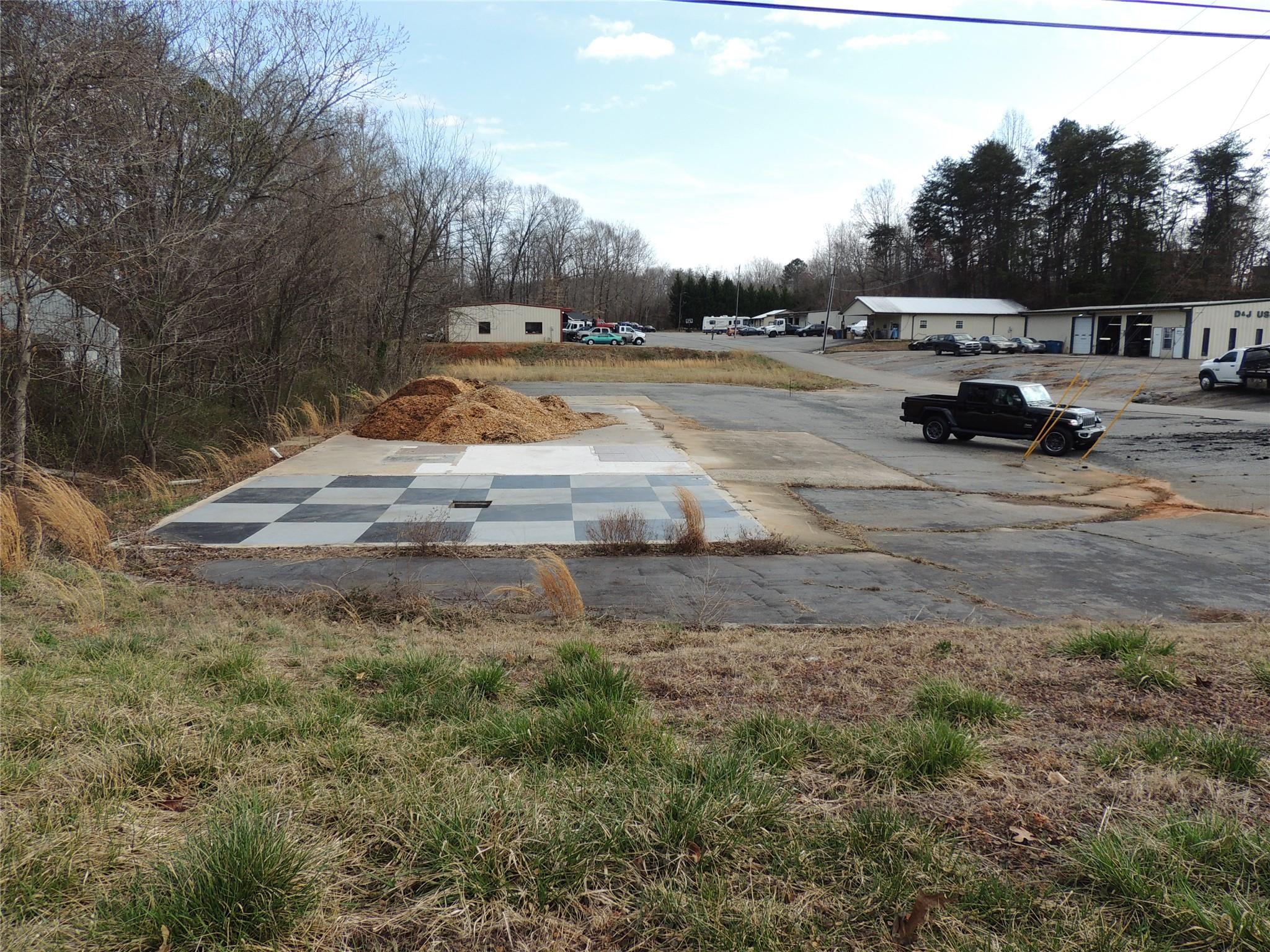 196 Highway 64 Rutherfordton, NC 28139 - Photo 2 of 10 a view of the side of a road