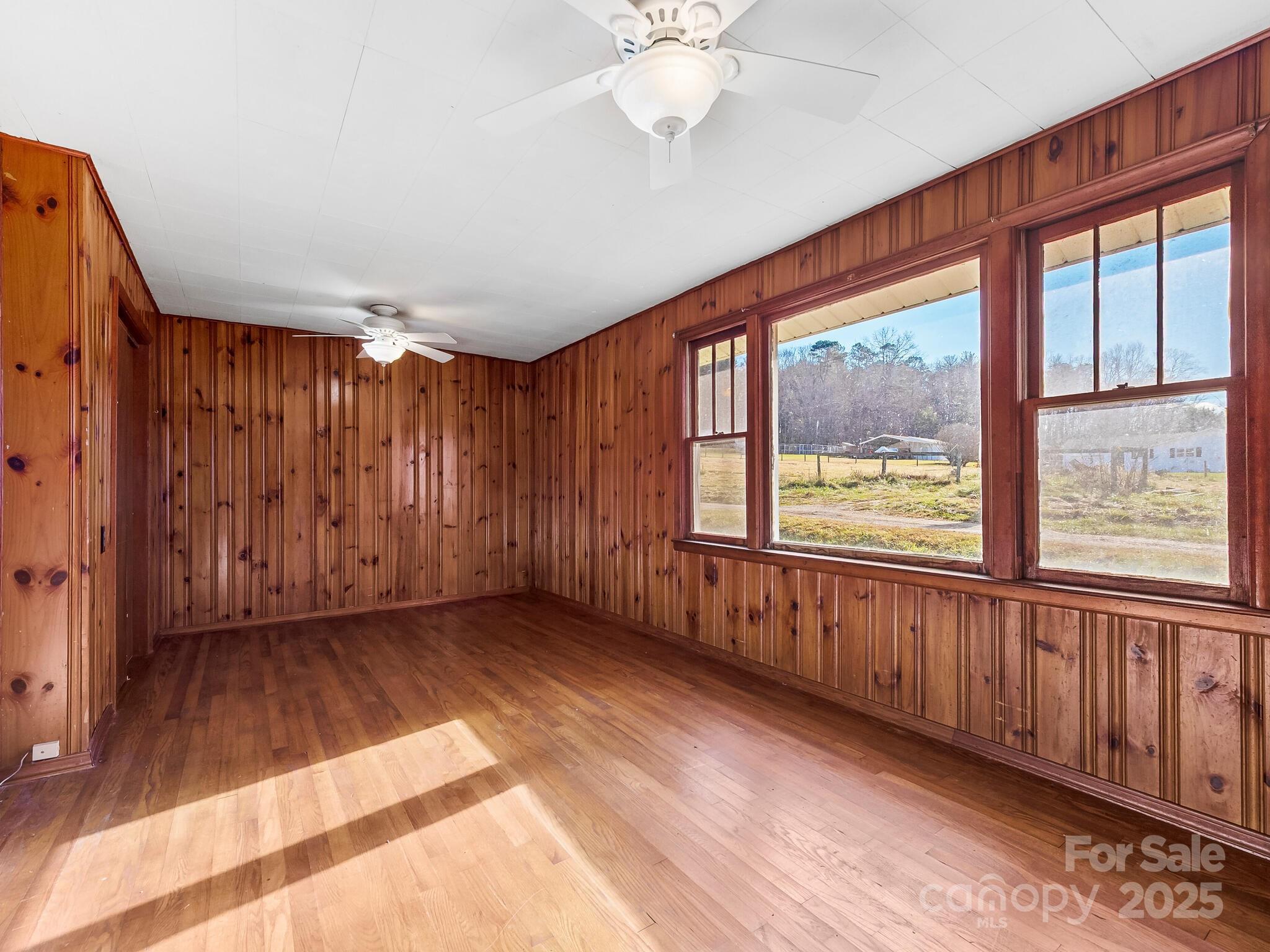 71 Lower Glady Fork Road Candler, NC 28715 - Photo 18 of 43 a view of an empty room with a window