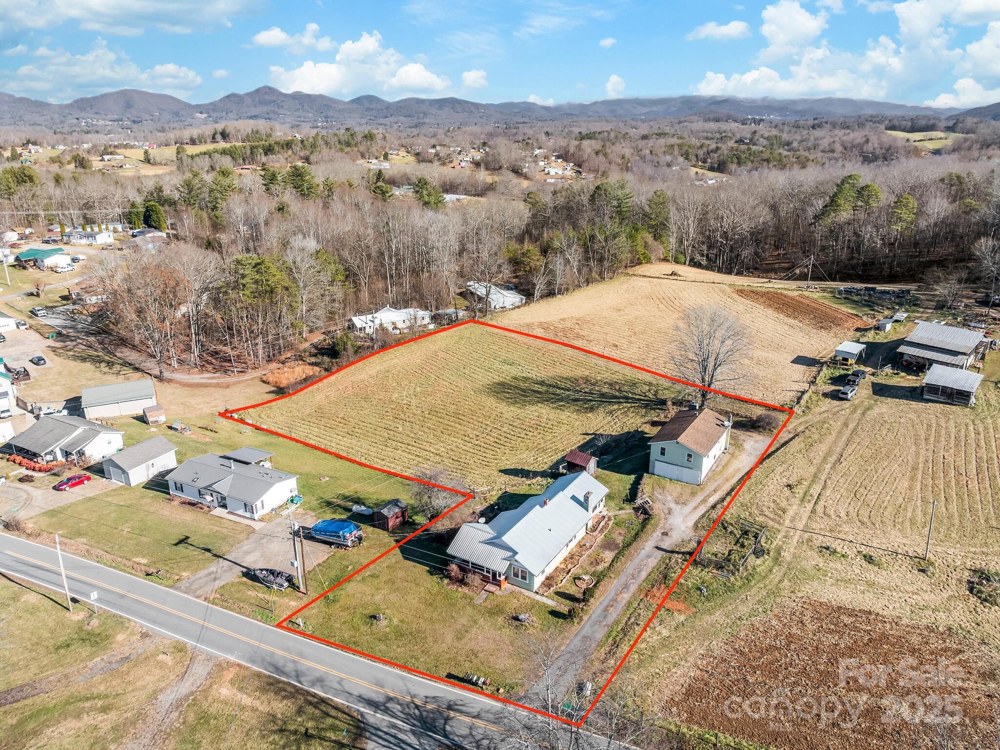 71 Lower Glady Fork Road Candler, NC 28715 - Photo 2 of 43 a view of a terrace with mountain view