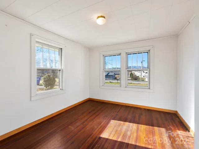 a view of a room with wooden walls