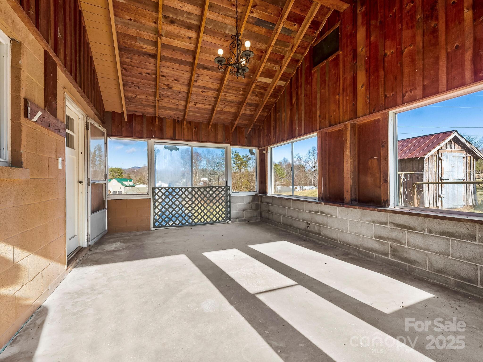 71 Lower Glady Fork Road Candler, NC 28715 - Photo 23 of 43 a view of a room with wooden walls