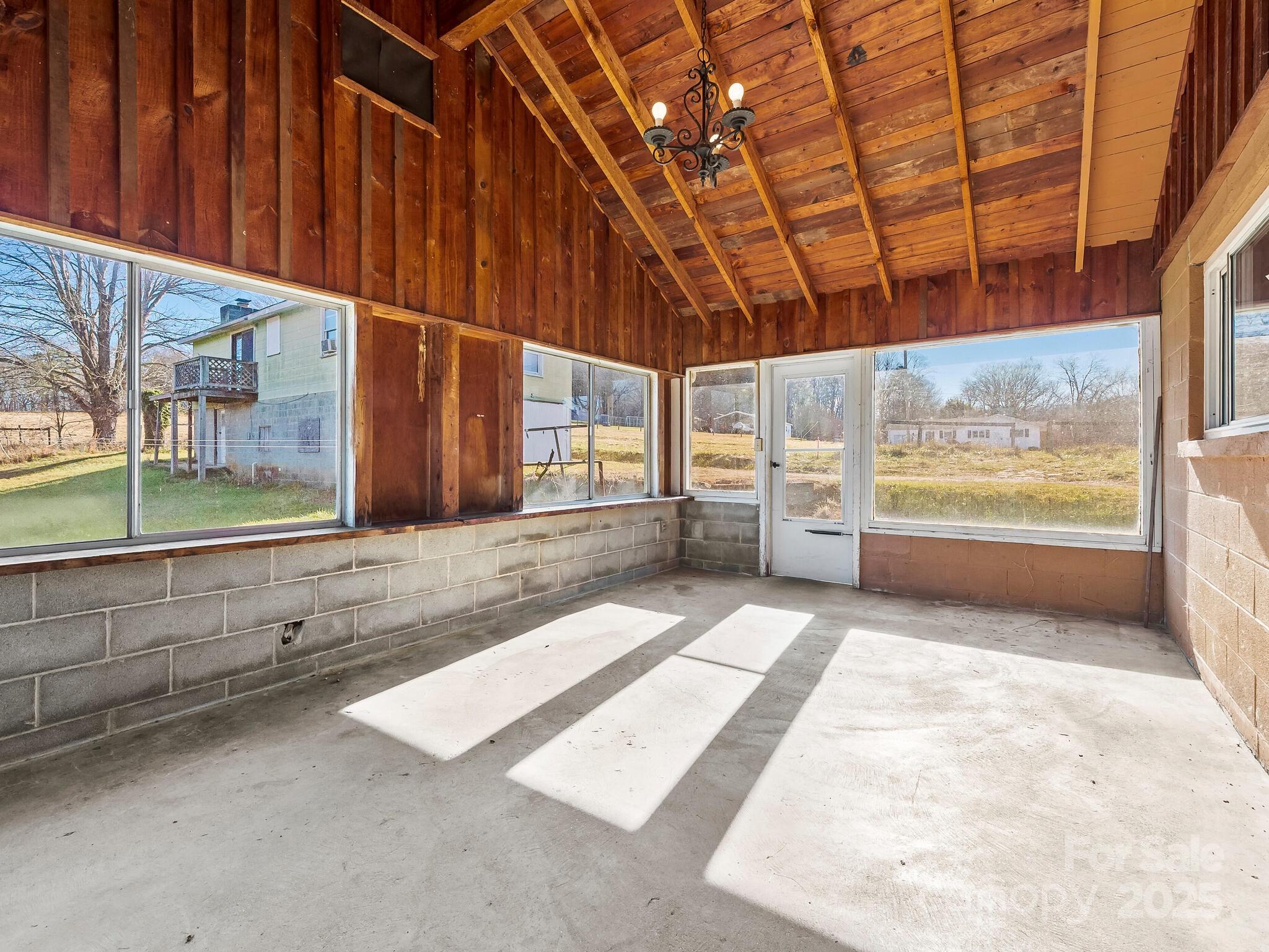 71 Lower Glady Fork Road Candler, NC 28715 - Photo 24 of 43 a view of an empty room with a window