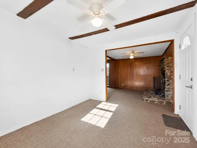 a room with a sink and cabinets