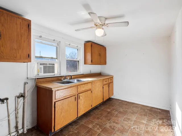 a view of a room that has a window in it