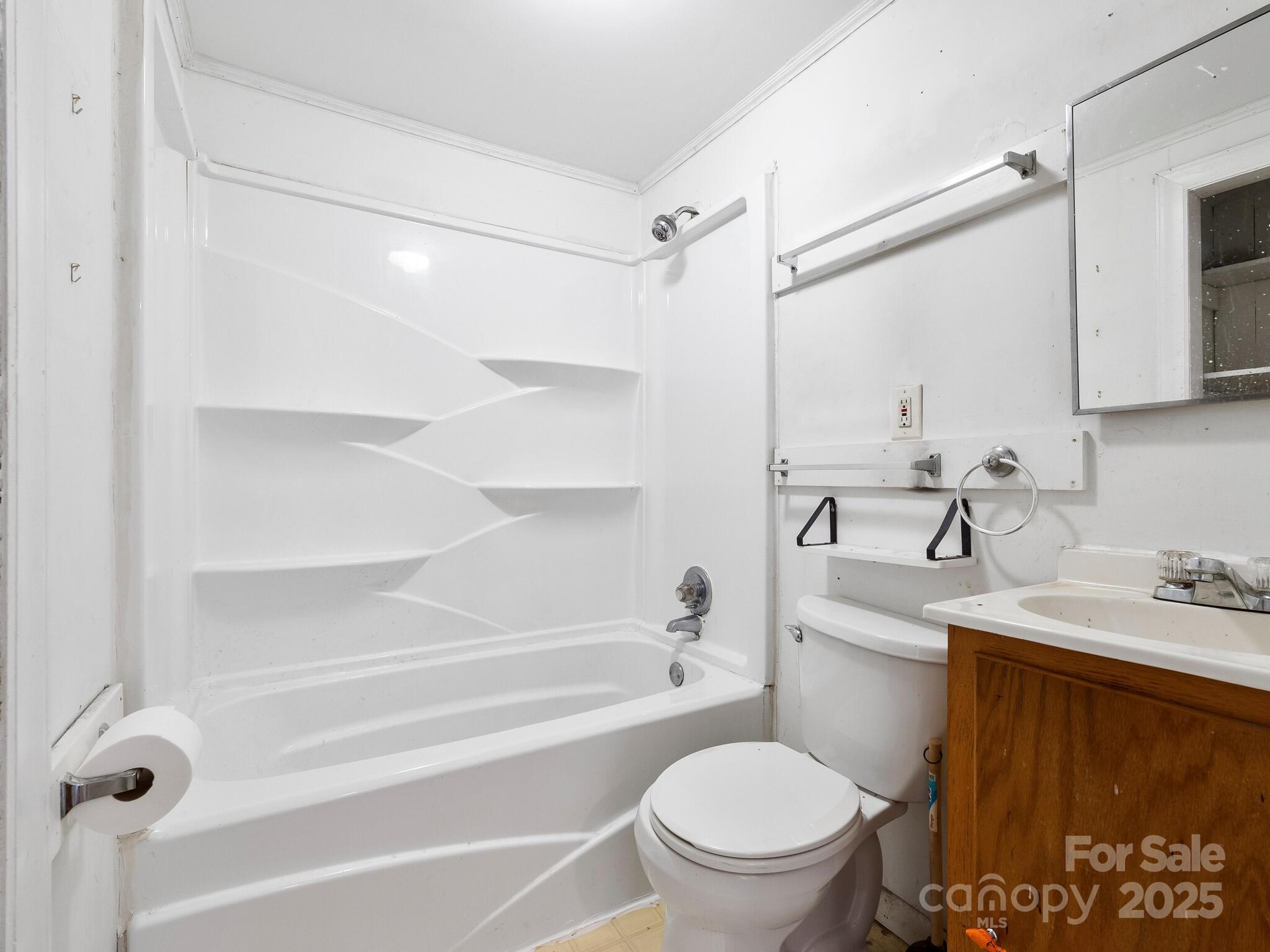 71 Lower Glady Fork Road Candler, NC 28715 - Photo 37 of 43 a bathroom with a sink toilet and shower