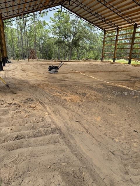 16386 Kakawi Road Weeki Wachee, FL 34614 - Photo 11 of 14 a view of a backyard of a house