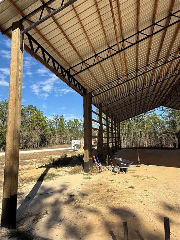 16386 Kakawi Road Weeki Wachee, FL 34614 - Photo 4 of 14 a view of a backyard of a house