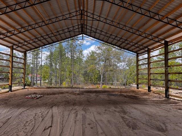 16386 Kakawi Road Weeki Wachee, FL 34614 - Photo 9 of 14 a view of a backyard