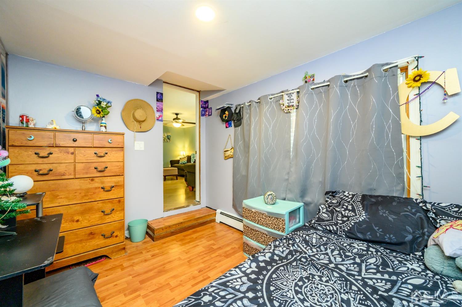 69 Bergerville Road Freehold, NJ 07728 - Photo 16 of 28 a bedroom with a bed and a closet