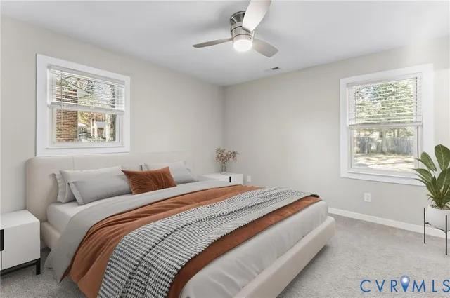 a bedroom with bed and a window