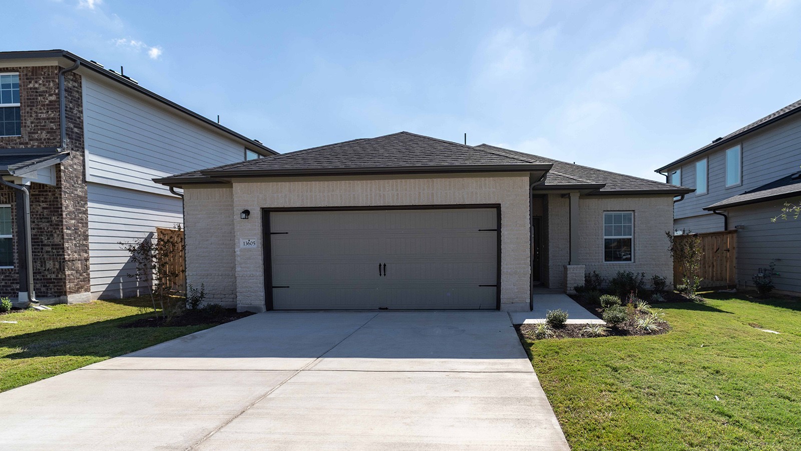 a house view with a backyard space