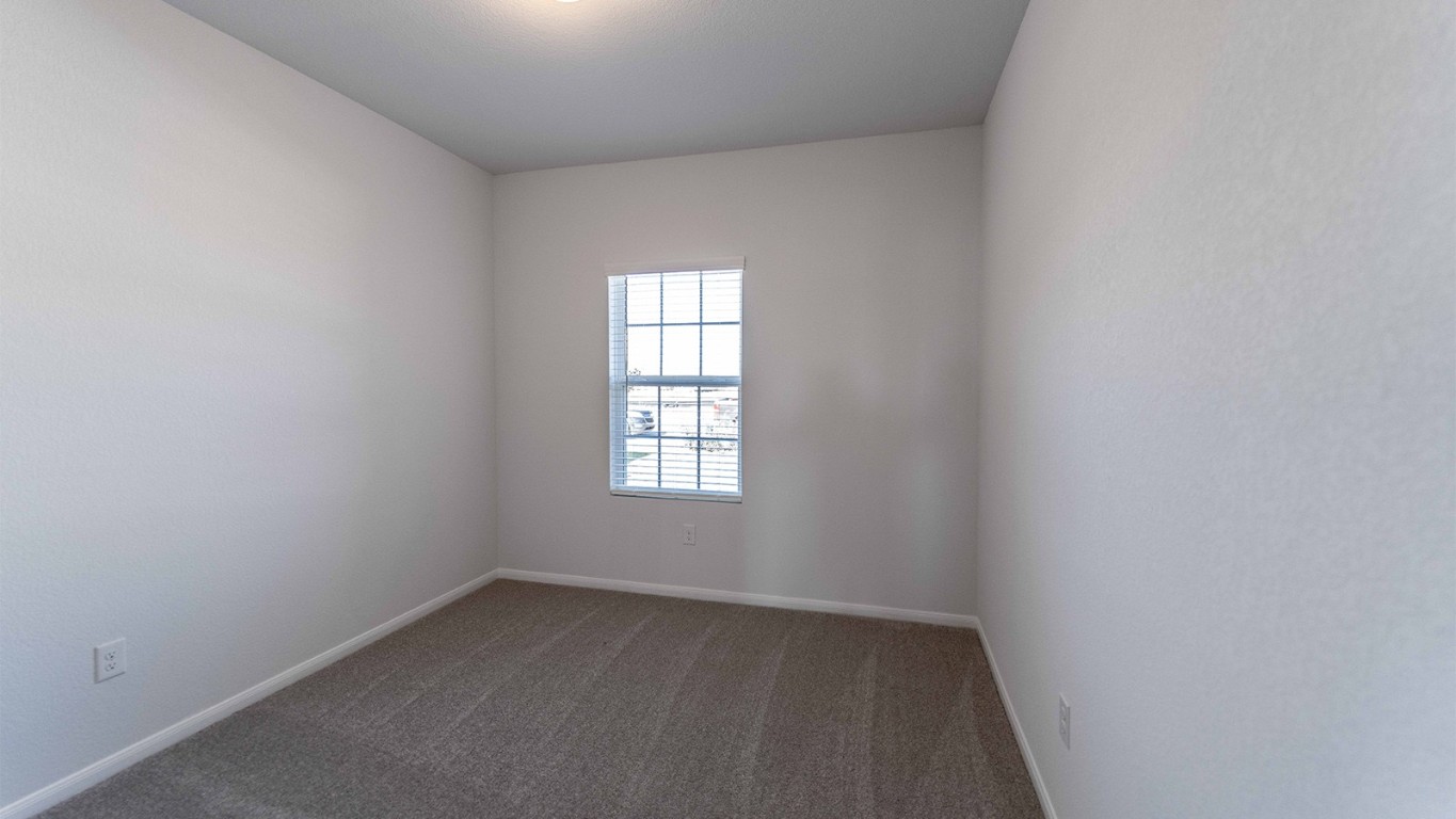13605 Endless Narrow Lane Elgin, TX 78621 - Photo 15 of 16 an empty room with a window