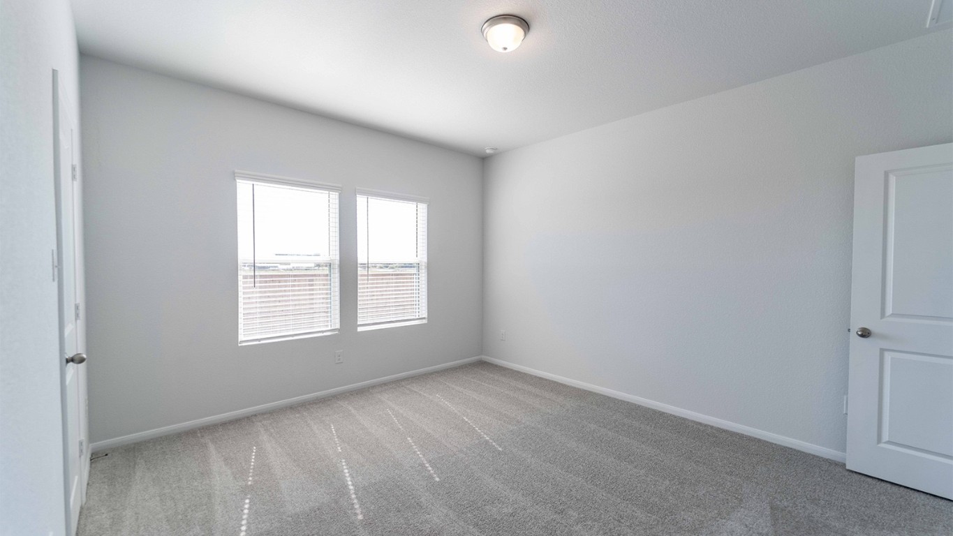 13605 Endless Narrow Lane Elgin, TX 78621 - Photo 16 of 16 an empty room with a window