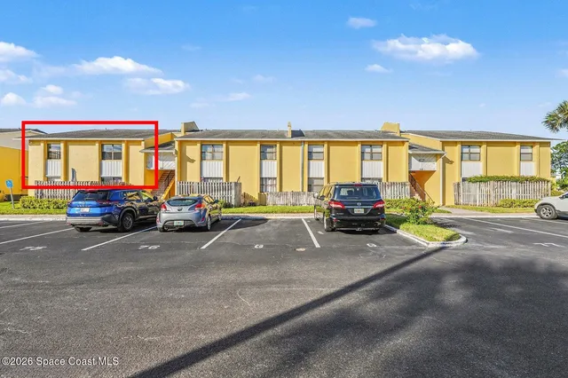 a car parked in front of a house