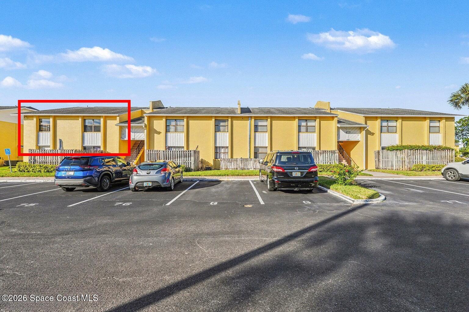 a car parked in front of a house