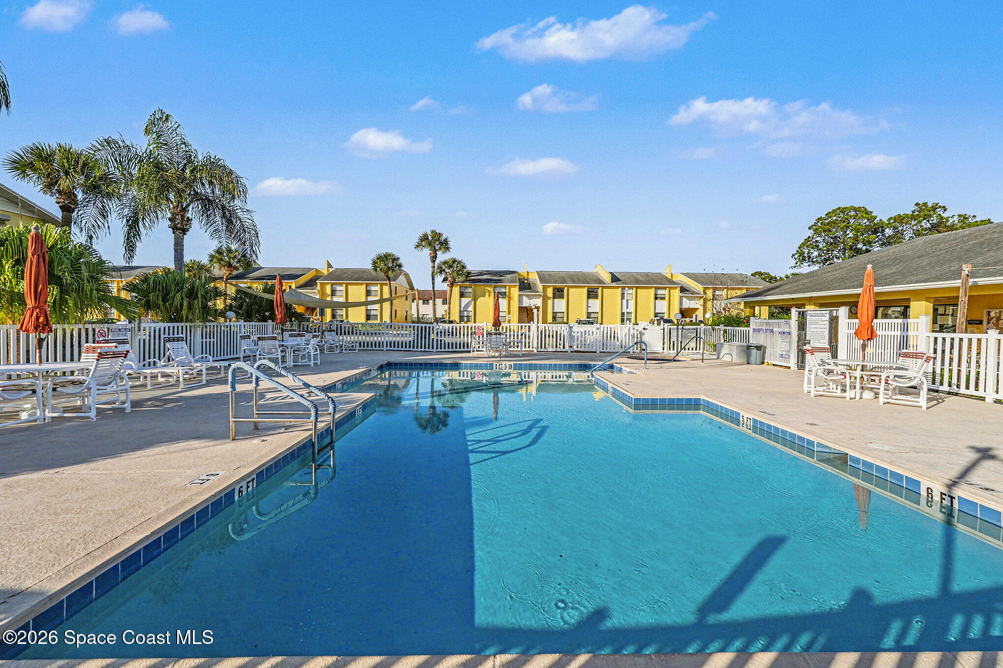 598 North Wickham Road, Unit 74 Melbourne, FL 32935 - Photo 13 of 13 a view of swimming pool with outdoor seating