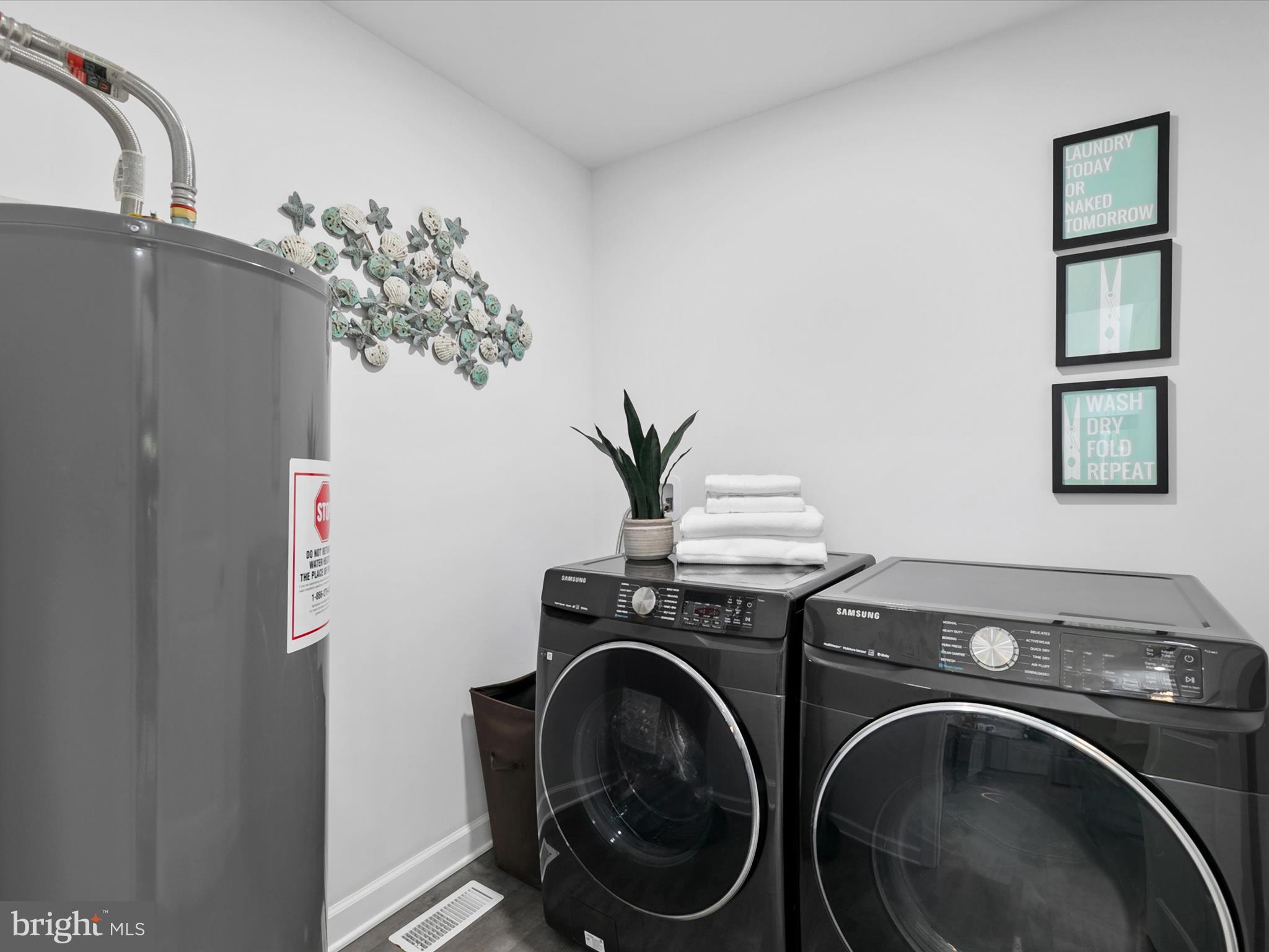 26076 Anderson Corner Road Georgetown, DE 19947 - Photo 24 of 36 a utility room with dryer and washer