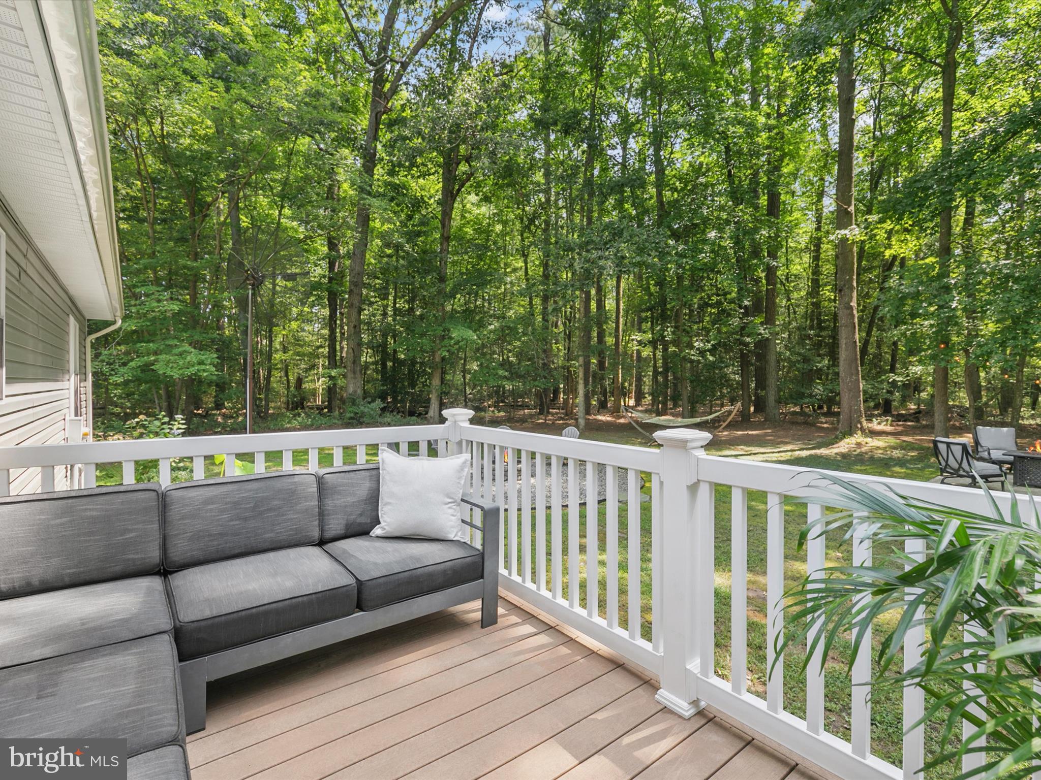 26076 Anderson Corner Road Georgetown, DE 19947 - Photo 25 of 36 a view of a two chairs in the roof deck
