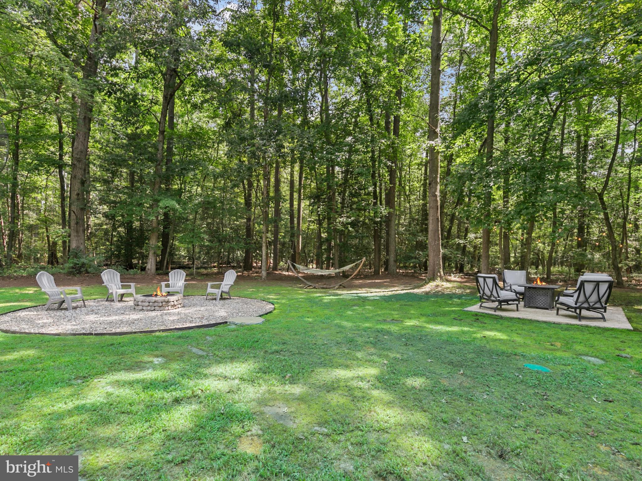 26076 Anderson Corner Road Georgetown, DE 19947 - Photo 27 of 36 a view of back yard with outdoor seating