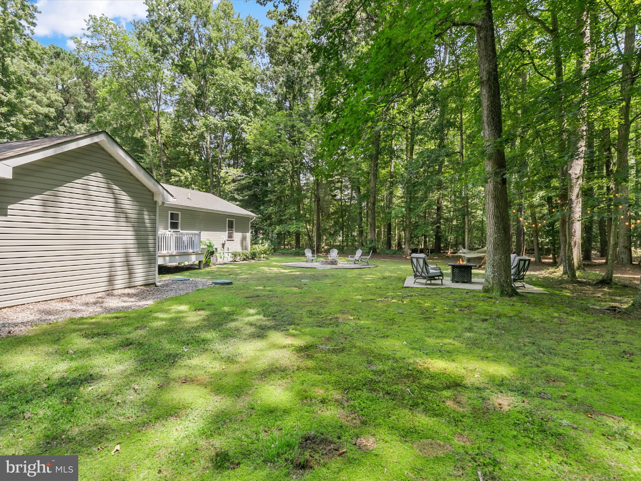 26076 Anderson Corner Road Georgetown, DE 19947 - Photo 33 of 36 a front view of house with yard and green space