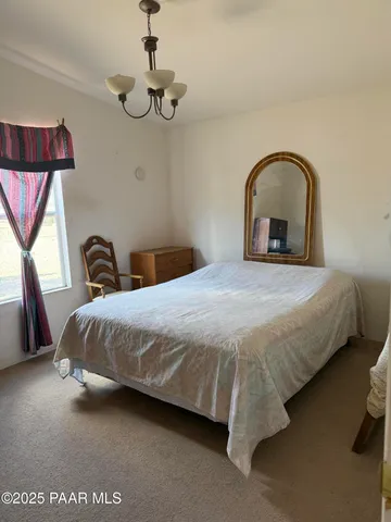 a view of a storage and utility room in a house