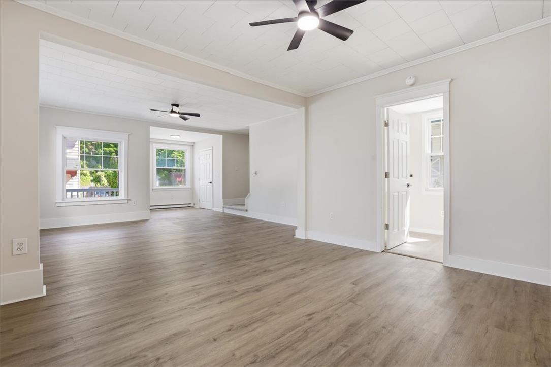 110 Messinger Street Bangor, PA 18013 - Photo 35 of 39 An inviting open floorplan living area featuring neutral tones and handsome plank flooring.